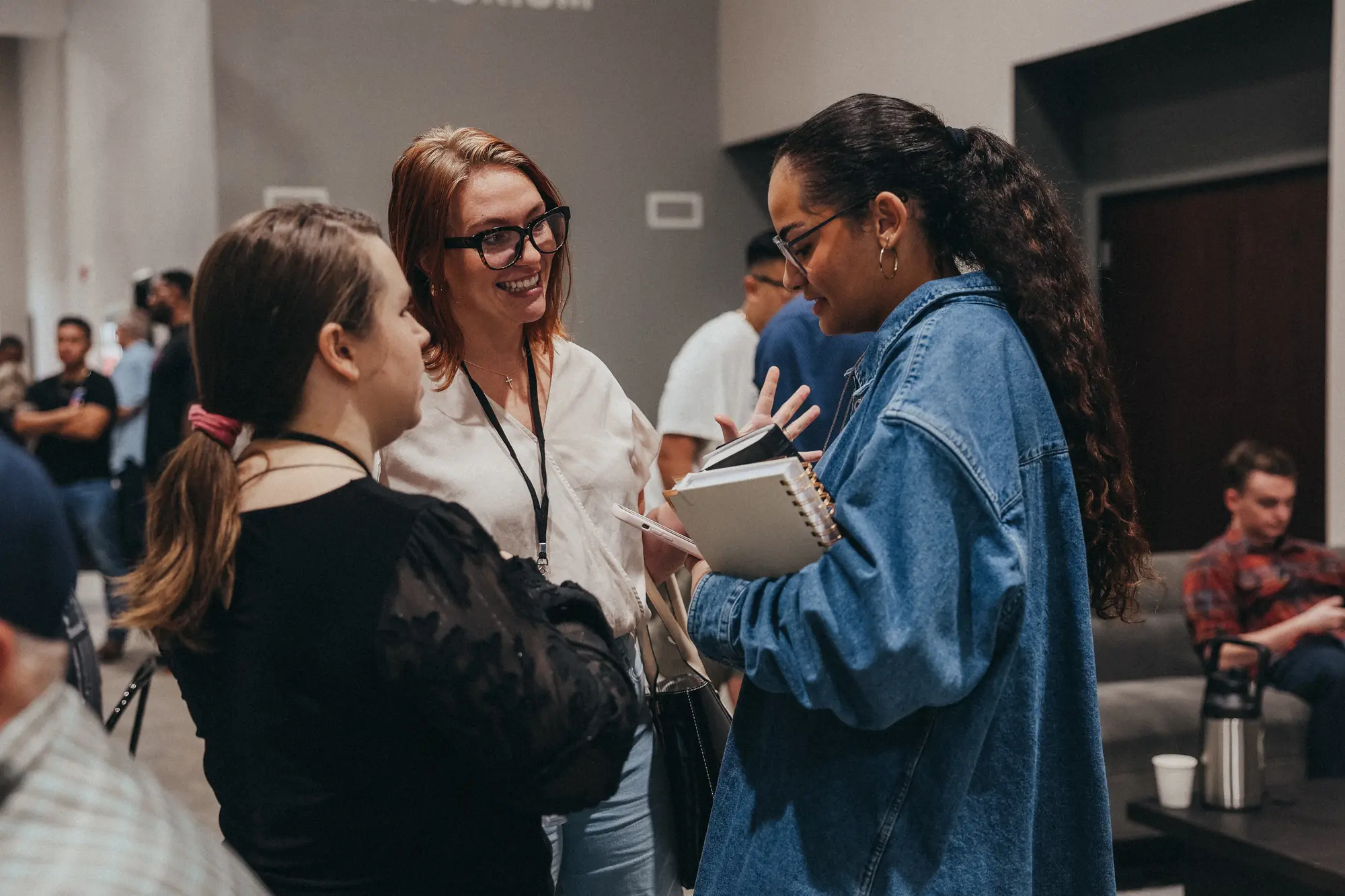 Friends connecting in the lobby after service