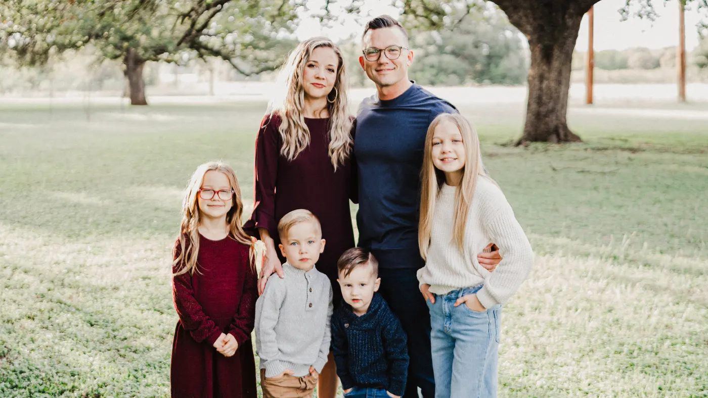 A family celebrating completing MembershipU
